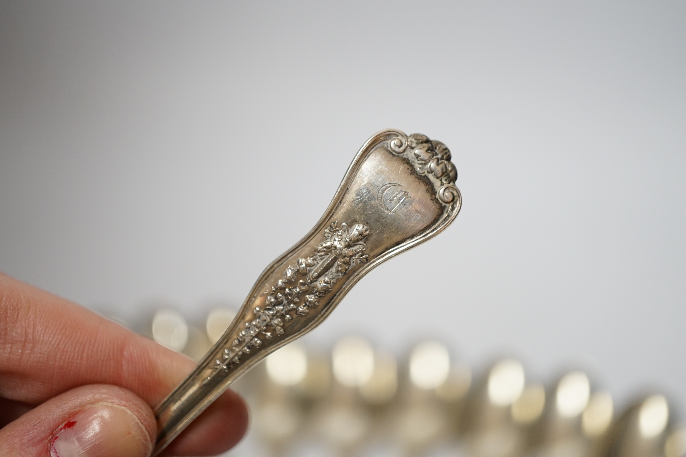 A set of six late 19th/early 20th century Tiffany & Co sterling teaspoons and five similar ice cream spoons, latter 18.7cm, 15.8oz.
